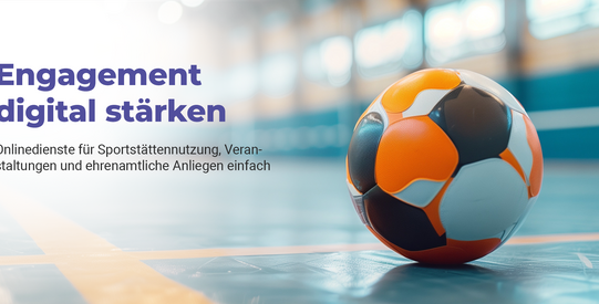 Handball liegt auf dem Boden einer Sporthalle.